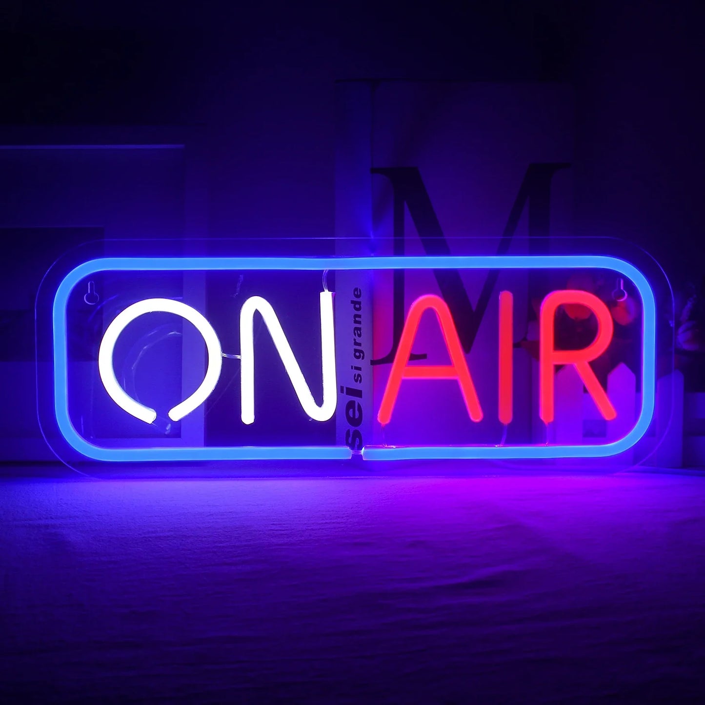 The image features a vibrant "ON AIR" LED neon sign crafted by The Art Neon brand.