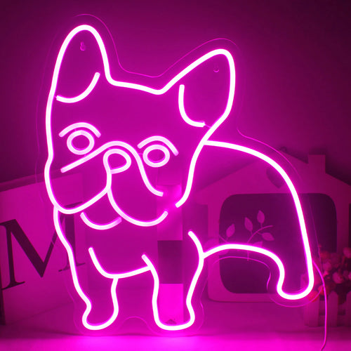 Bilden har en levande rosa LED-neonskylt formad i konturerna av en hund.