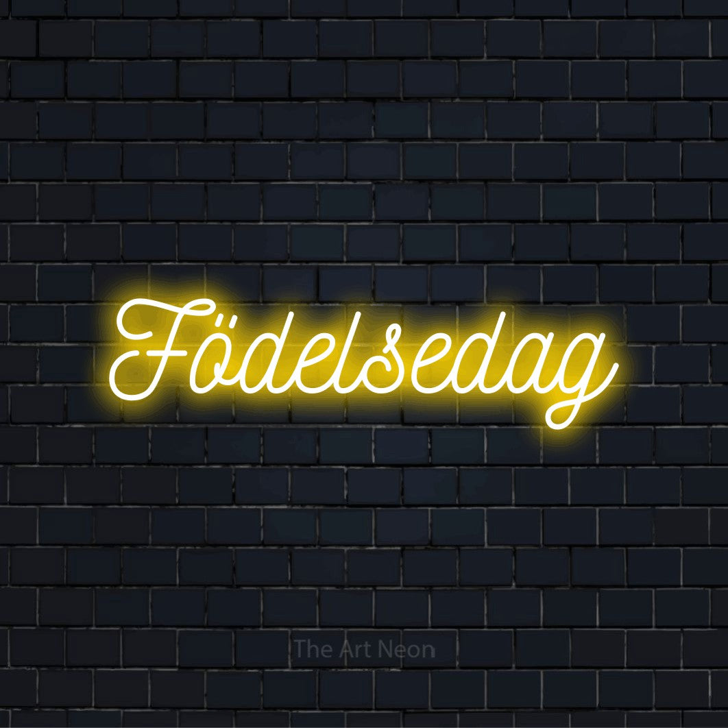 Personlig neonskylt med texten “Födelsedag” på en svart tegelvägg