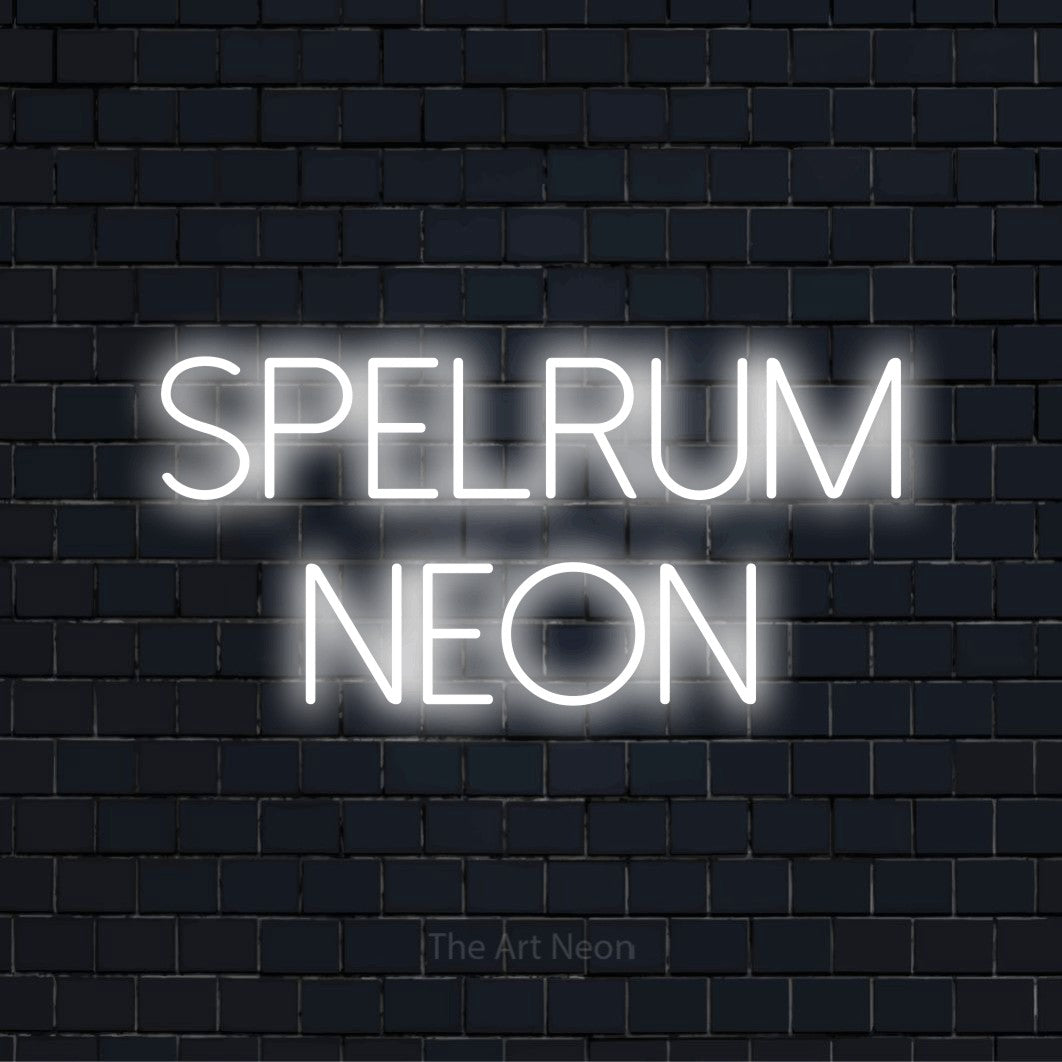 Personlig neonskylt med texten “Spelrum Neon” på en svart tegelvägg