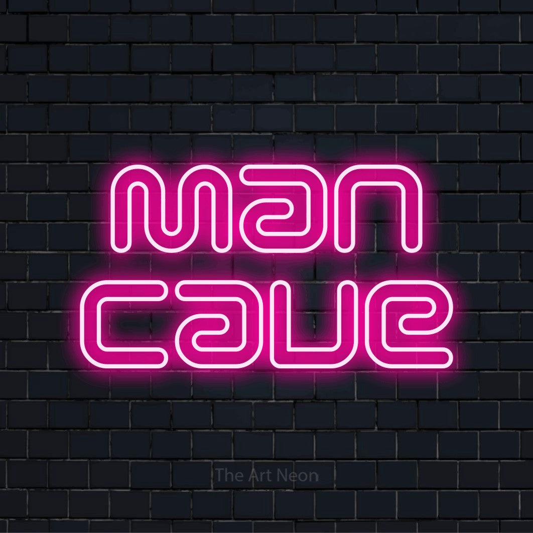 Personlig neonskylt med texten “Man Cave” på en svart tegelvägg
