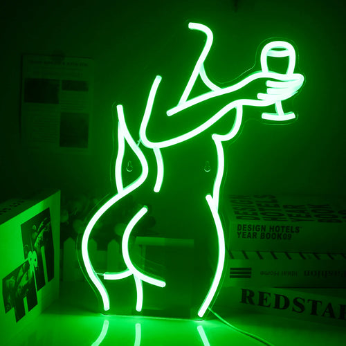 Bilden har en levande LED-neonskylt som visar konturen av en stilfullt klädd kvinna som håller i ett vinglas.