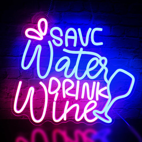 Kuvassa on eloisa LED-valokyltti, jossa on teksti "Save Water Drink Wine" tyylikkäällä ja leikkisällä fontilla.