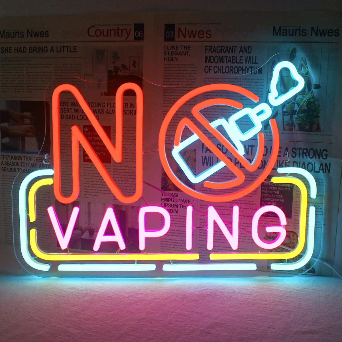 Kuvassa on eloisa, käsintehty LED-valokyltti, jossa lukee "No Vaping.
