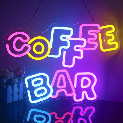Eloisa LED-neonkyltti, jossa on sanat "Coffee Bar" lämpimässä, keltaisessa sävyssä.