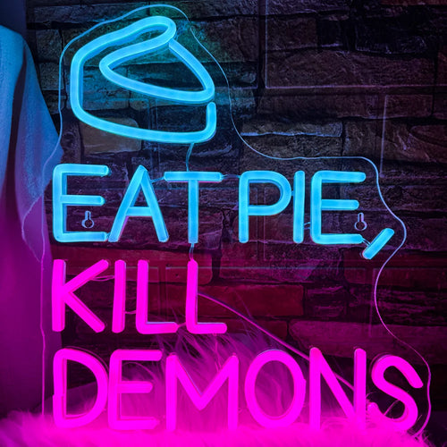 Kuvassa on käsintehty LED-valokyltti, jossa lukee "Eat Pie Kill Demons.