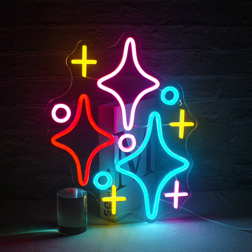 Bilden har en levande LED-neonskylt i form av en stjärnhop.