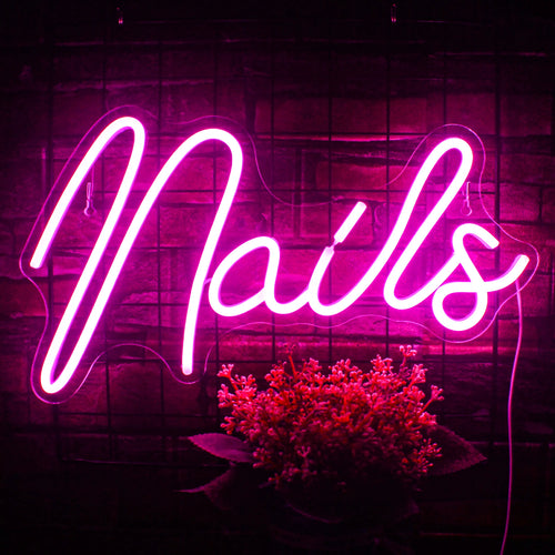 Bilden har en handgjord LED-neonskylt designad i form av en fingernagel.