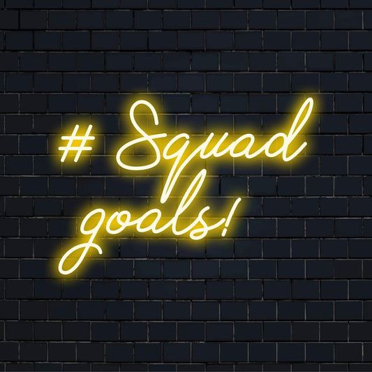 Custom LED neon sign featuring '#Squad Goals!' in vibrant colors, ideal for enhancing any space with modern flair.