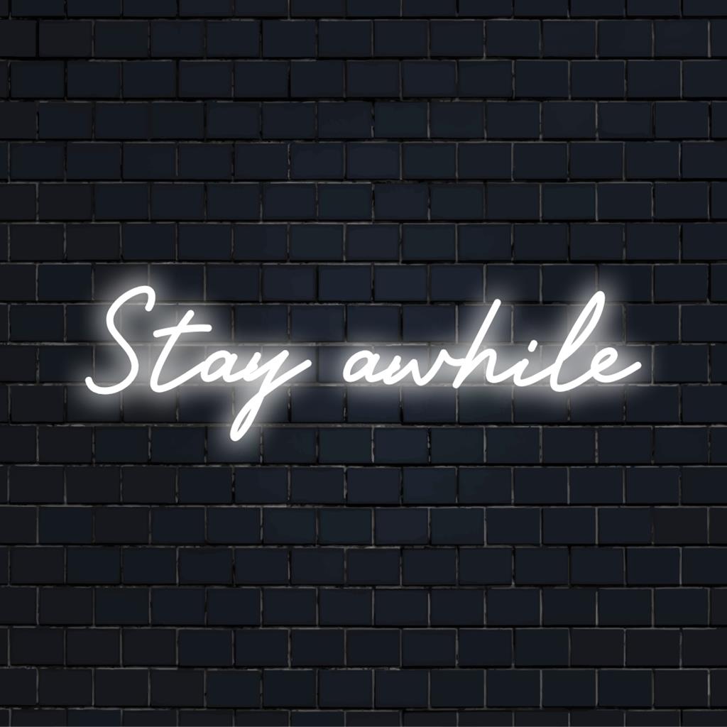 Räätälöity Stay Awhile LED-neon, joka yhdistää sanataidetta ja valoa; muuttaa minkä tahansa tilan kutsuvalla hehkullaan.