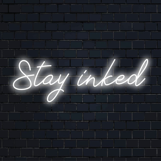 Vibrant handmade LED neon sign reading Stay Inked, ideal for personalized neon quote art or custom LED wall decor.