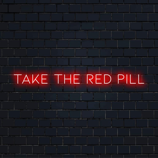 LED-valokyltti, jossa on sana Take The Red Pill kirkkaassa, katseenvangitsijassa valossa. Täydellinen moderniin seinän sisustukseen.
