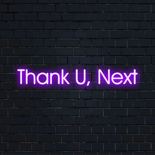 Mittatilaustyönä valmistettu LED-neonkyltti, jossa on Kiitos U, Next kirkkaassa valotaideessa; täydellinen moderniin sisustukseen ja tunnelman kohoamiseen.