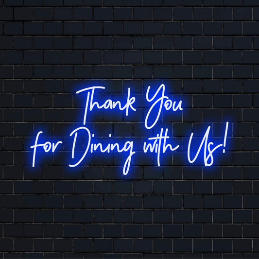 LED-valokyltti, jossa lukee Kiitos, että syöt kanssamme! kirkkain ja lämpimin sävyin, jotka sopivat täydellisesti vieraanvaraisiin tiloihin ja yksilölliseen sisustukseen.