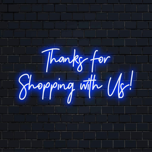 Mittatilaustyönä valmistettu LED-valokyltti, jossa lukee Kiitos ostoksestasi! Täydellinen neonvalo sisustus liikkeisiin tai yrityksille.