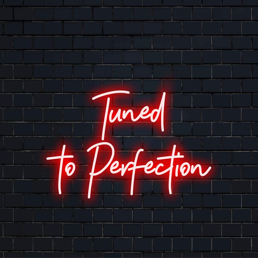 Vibrant Tuned To Perfection LED neon sign, perfect for adding flair and ambiance to any setting. Custom-made neon decor.