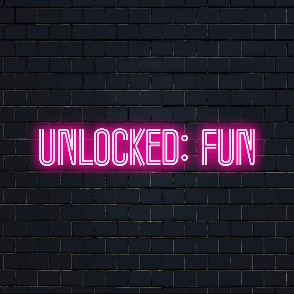 Värikäs LED-valokyltti, jossa lukee Unlocked Fun, vangitsee eloisaa energiaa, sopii täydellisesti ainutlaatuiseen seinätaideeseen ja valoisaan kodin sisustukseen.