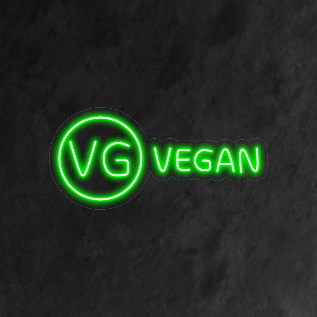"Vegan Neon Sign" säteilee elävää hehkua juhlistaen kasvipohjaista elämää ja kestävyyttä tilassasi.