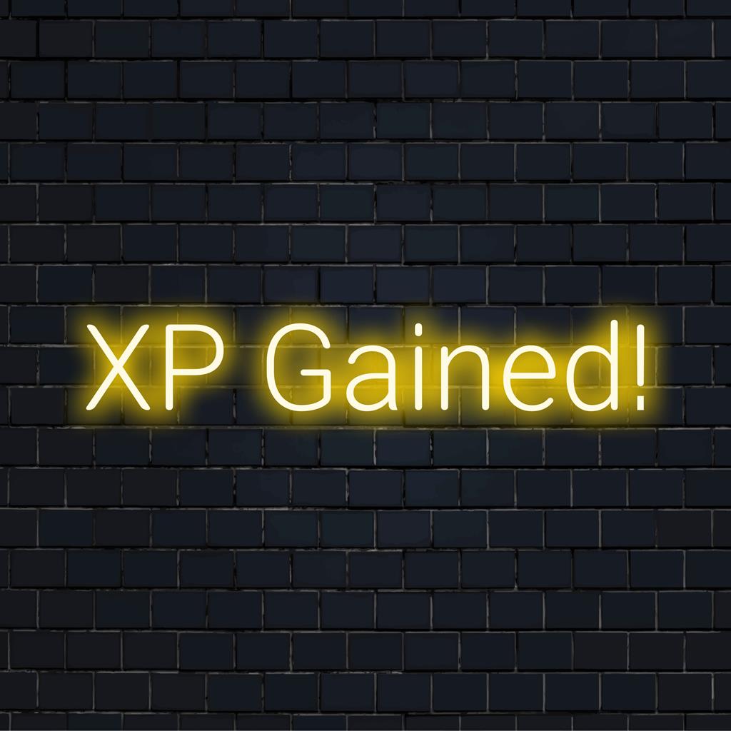 Custom LED neon sign reading XP Gained! in vibrant color; perfect decor for gamer spaces and modern interiors.