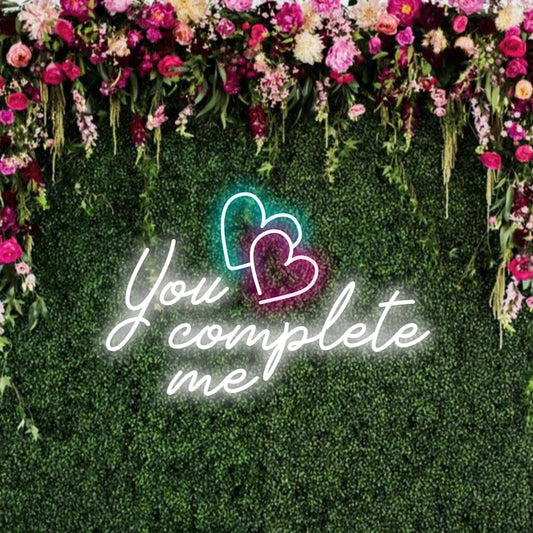 Custom LED neon sign with intertwined words You Complete Me, perfect for romantic neon wall decor.