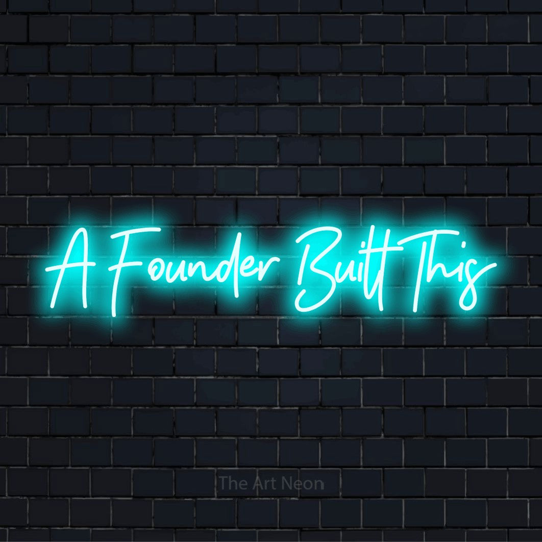 "A Founder Built This" LED neon sign on a black brick wall