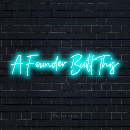 "A Founder Built This" LED neon sign on a black brick wall