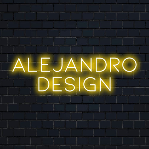 Alejandro Design Custom Name Neon Sign, bright LED glow on dark brick wall