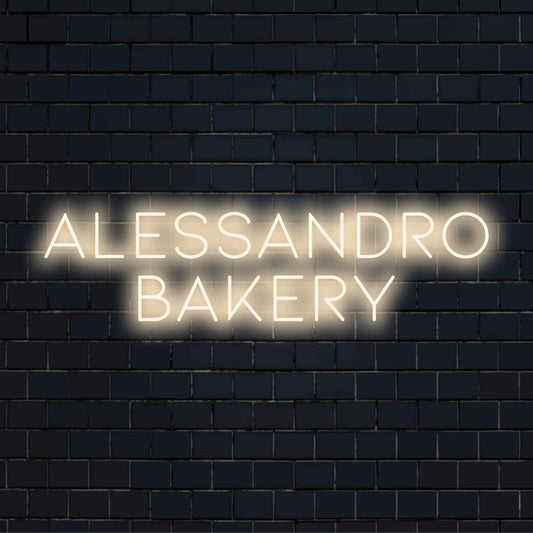 Alessandro Bakery Custom Name Neon Sign, neon text light against brick backdrop