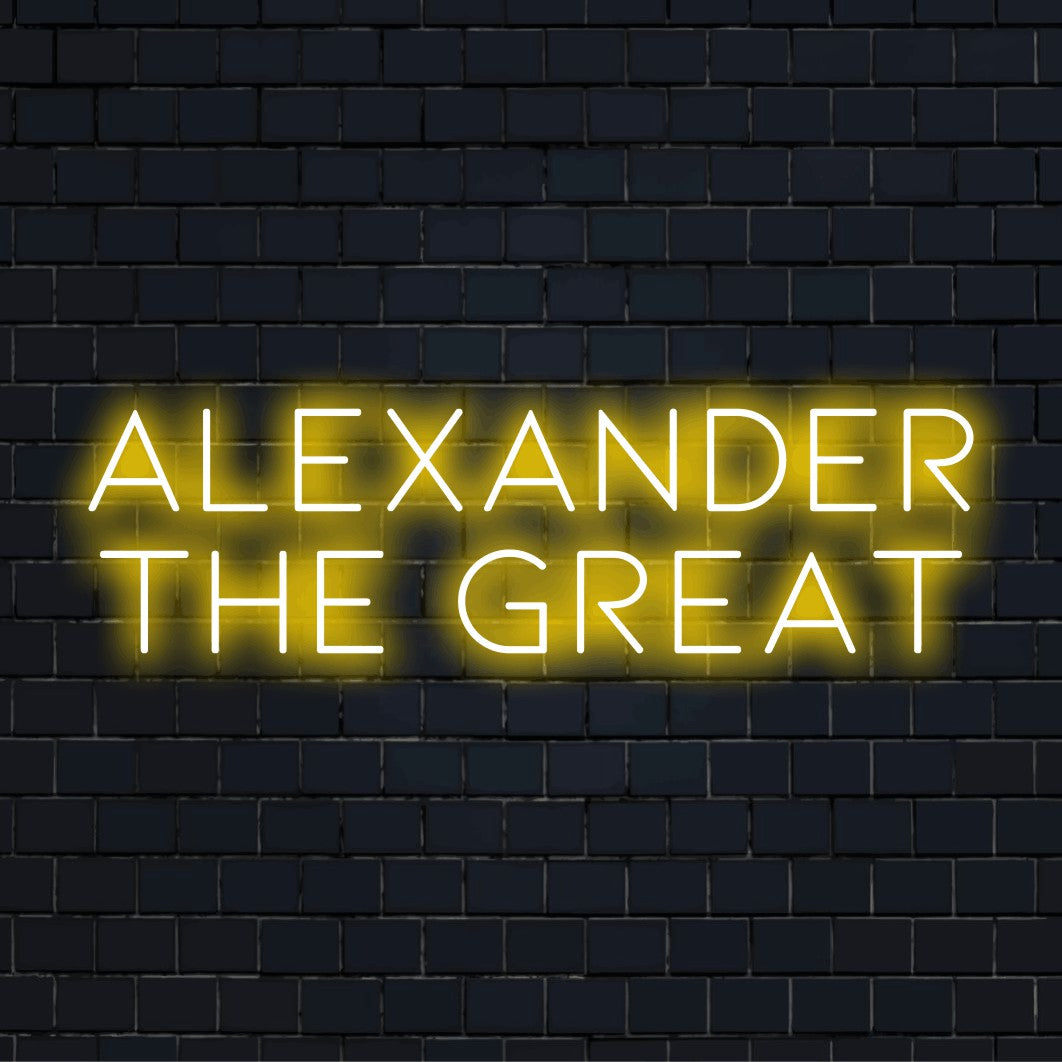 Alexander The Great LED Neon Sign, glowing lettering on dark brick wall