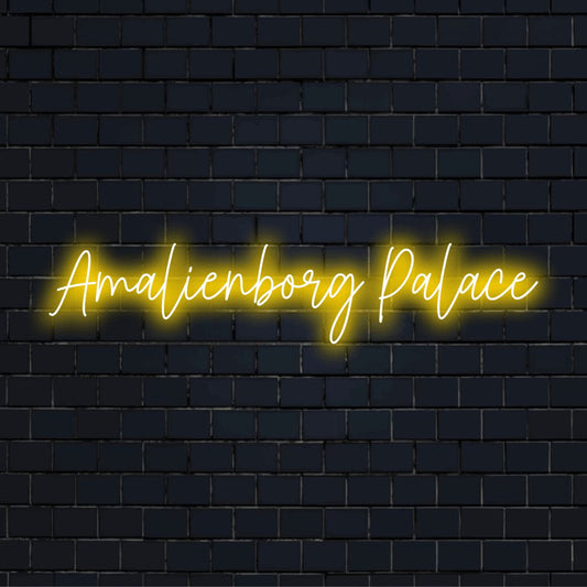 Amalienborg Palace Neon Light with glowing lettering on dark brick wall