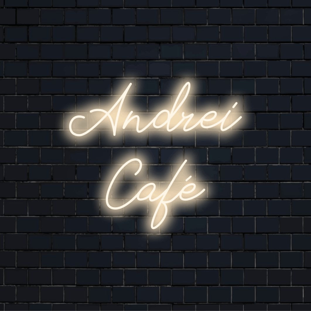 Andrei Cafe Custom Name Neon Sign, bright neon lettering on dark brick wall