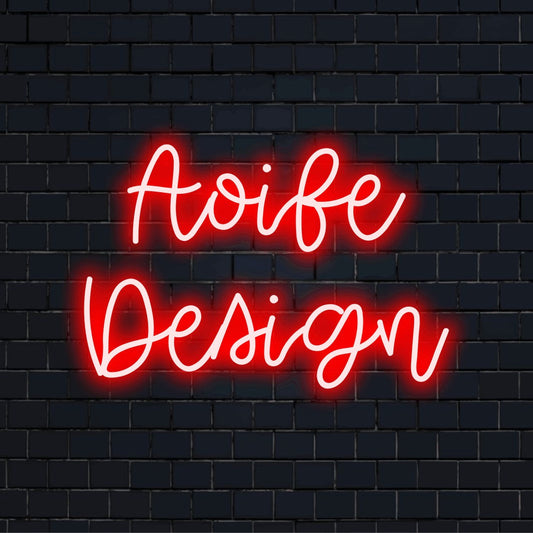 Aoife Design Personalized Neon Light with soft neon glow on dark brick background