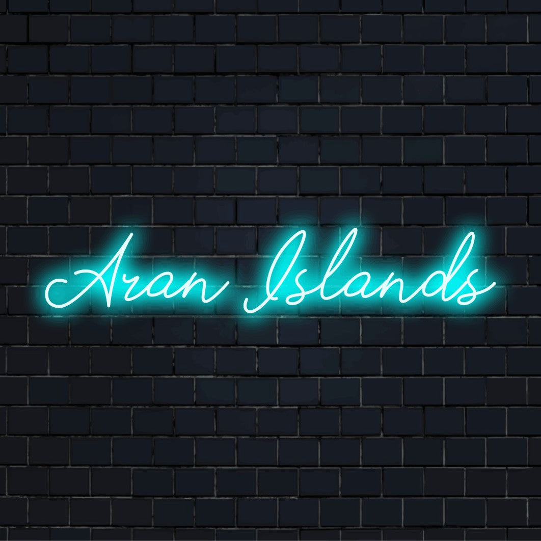 Aran Islands LED Neon Sign, neon text light on black brick background