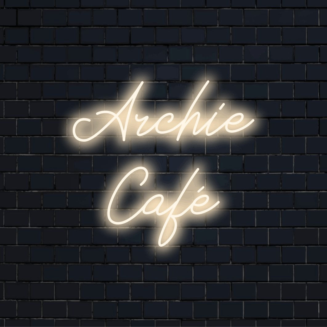 Archie Cafe Custom Name Neon Sign, bright neon glow on dark brick background