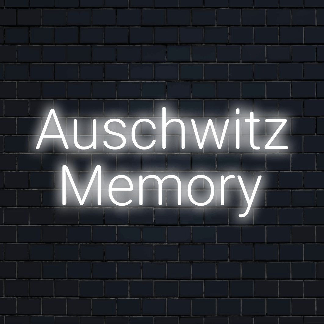 Auschwitz Memory Neon Light with bright neon glow on dark brick background