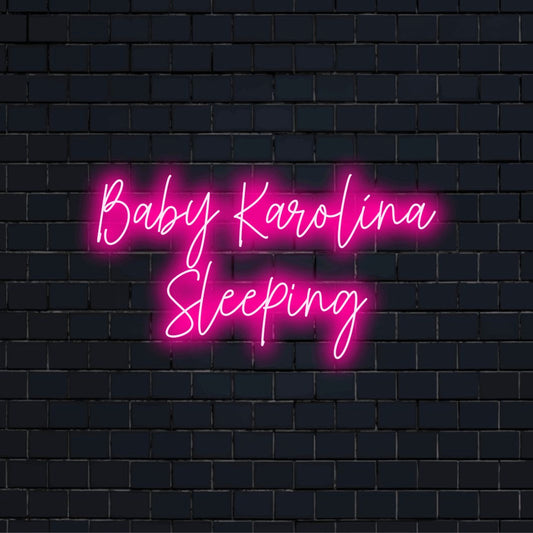 Baby Karolina Sleeping Personalized LED Neon Sign, bright neon glow on black brick background