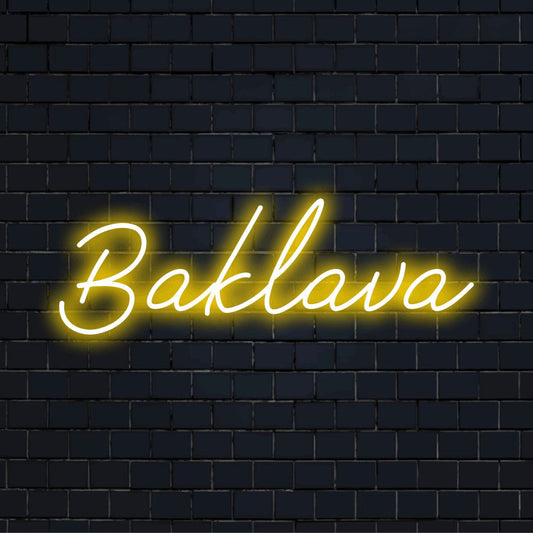 Baklava Neon Light with bright neon lettering against brick backdrop