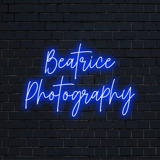 Beatrice Photography Custom Name Neon Sign, neon text light on dark brick wall