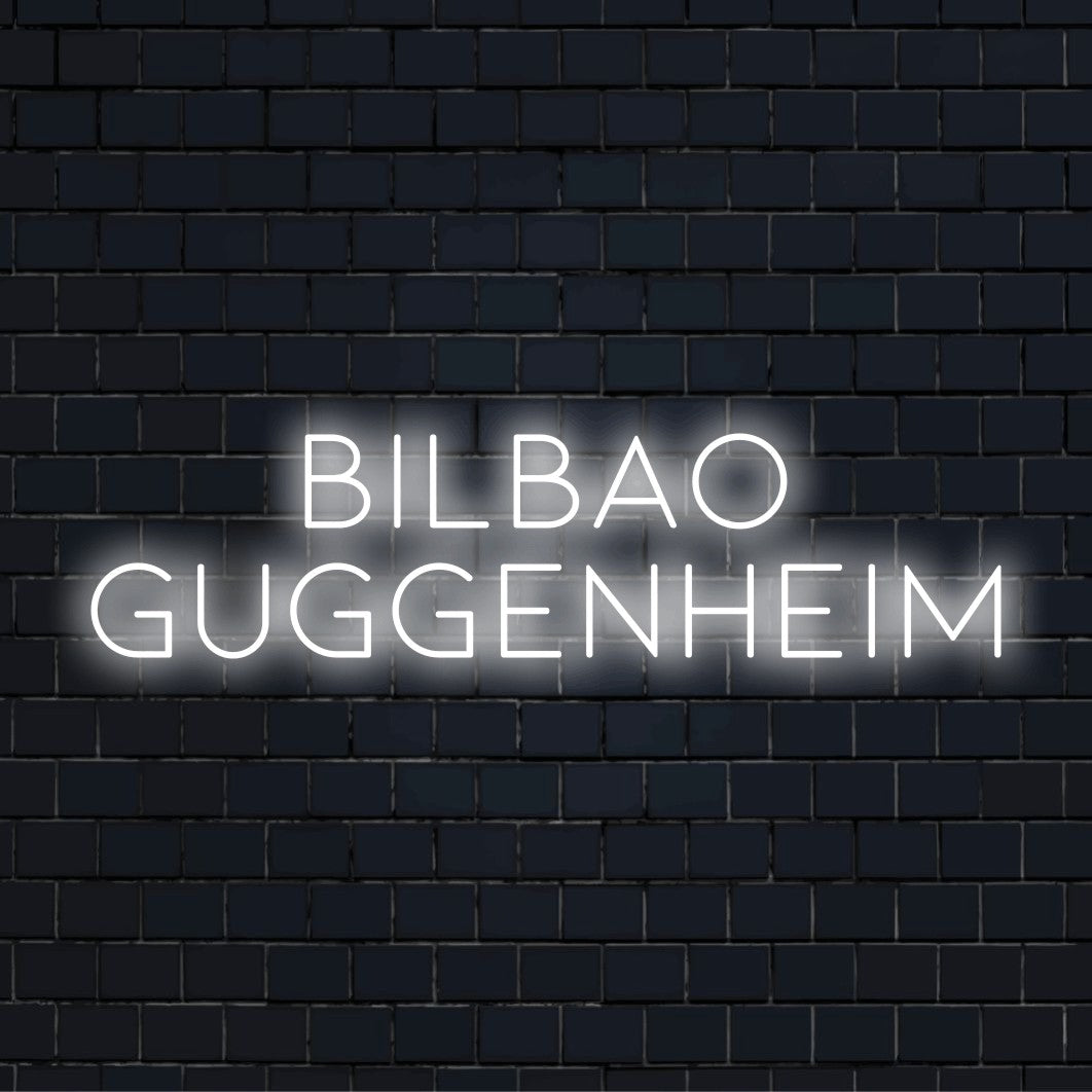Bilbao Guggenheim Neon Sign, glowing neon text on dark brick wall