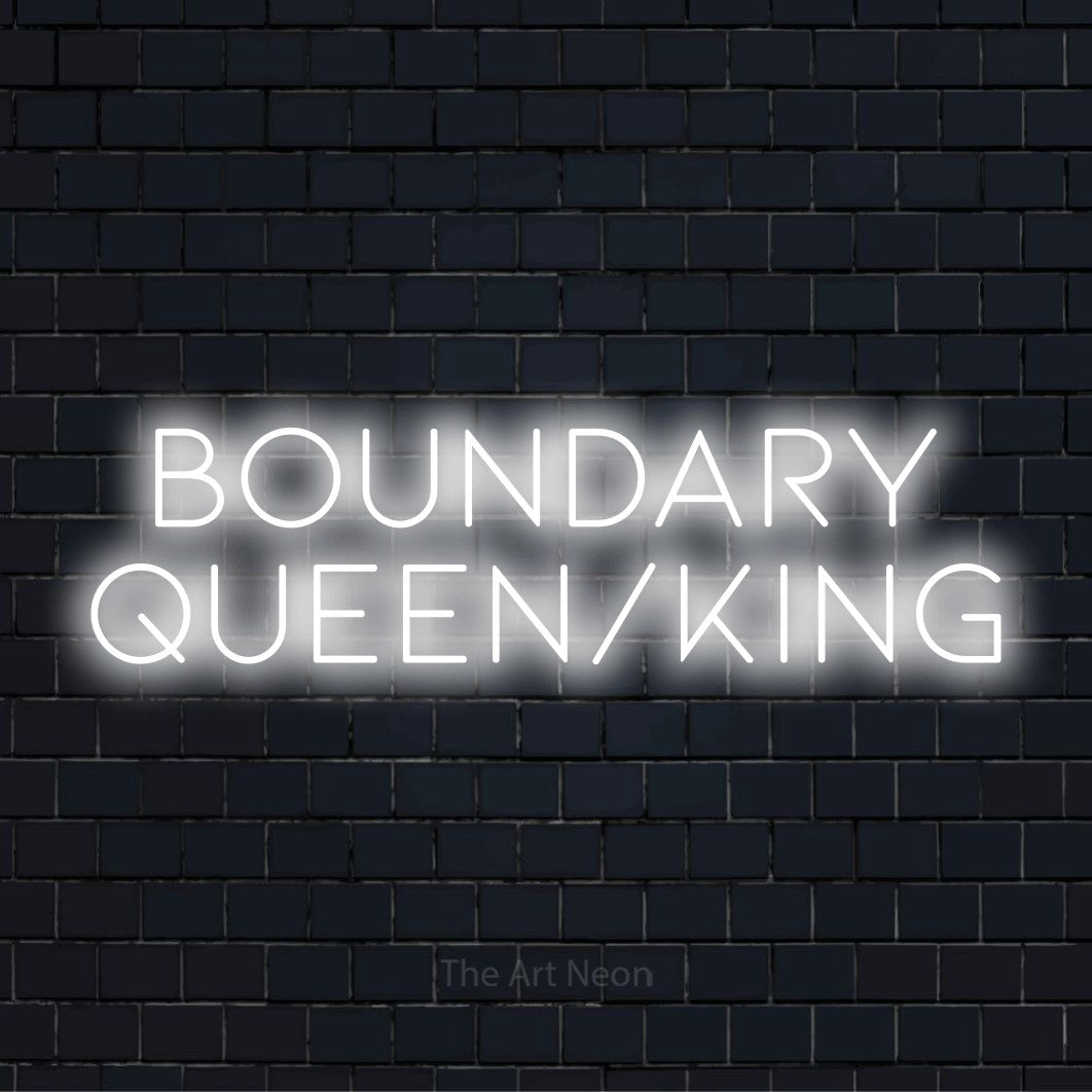 "Boundary Queen/king" neon text design on a black brick wall