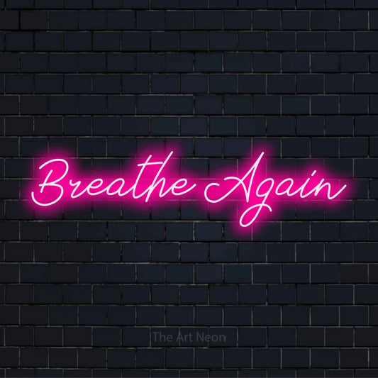 "Breathe Again" neon text design on a black brick wall