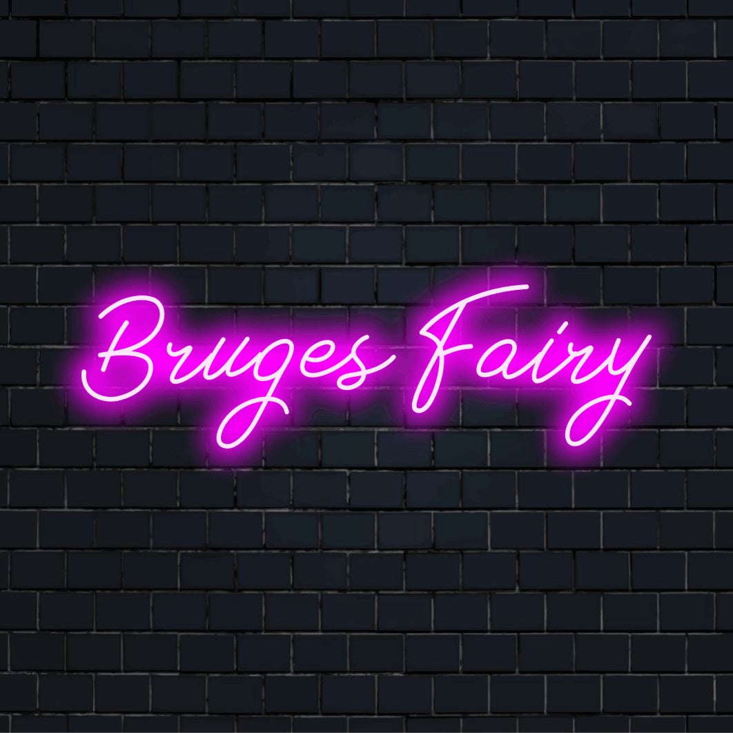 Bruges Fairy Neon Sign, bright neon lettering on dark brick wall