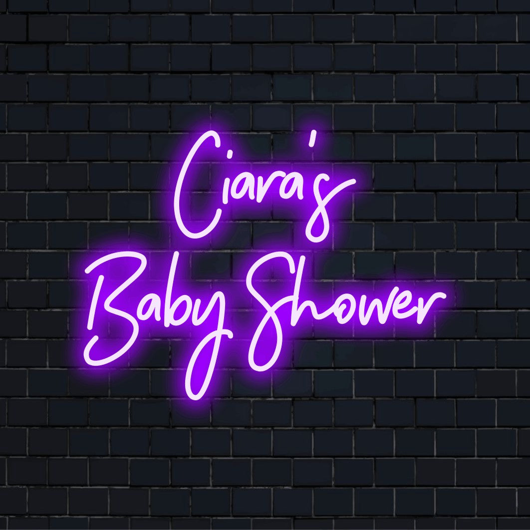 Ciara_s Baby Shower Personalized LED Neon Sign, bright LED glow on dark brick wall