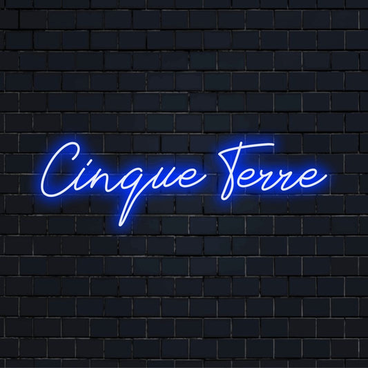 Cinque Terre Neon Sign, glowing lettering on dark brick background