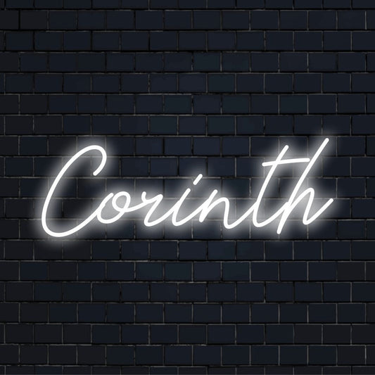 Corinth Neon Sign, bright LED glow against brick backdrop