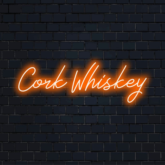 Cork Whiskey Neon Sign, glowing lettering on dark brick wall