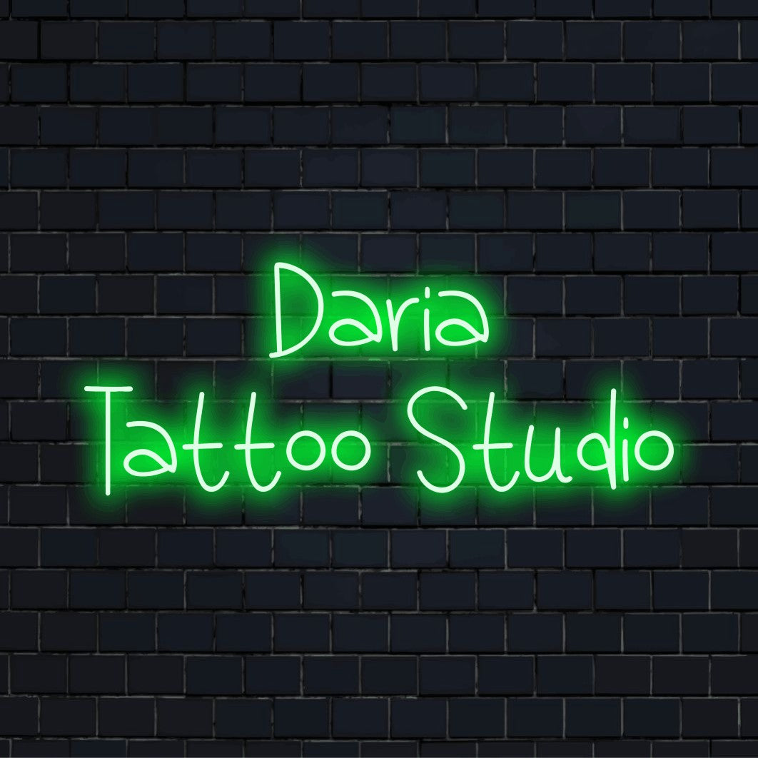 Daria Tattoo Studio Personalized LED Neon Sign, bright neon glow on dark brick background