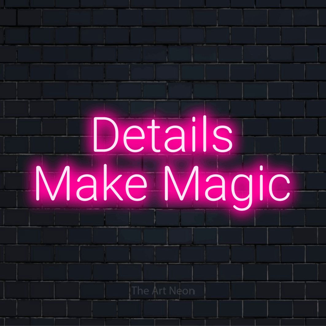 "Details Make Magic" LED neon sign on a black brick wall