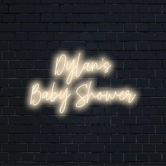 Dylan_s Baby Shower Custom Name Neon Sign, glowing wall decor on black brick background