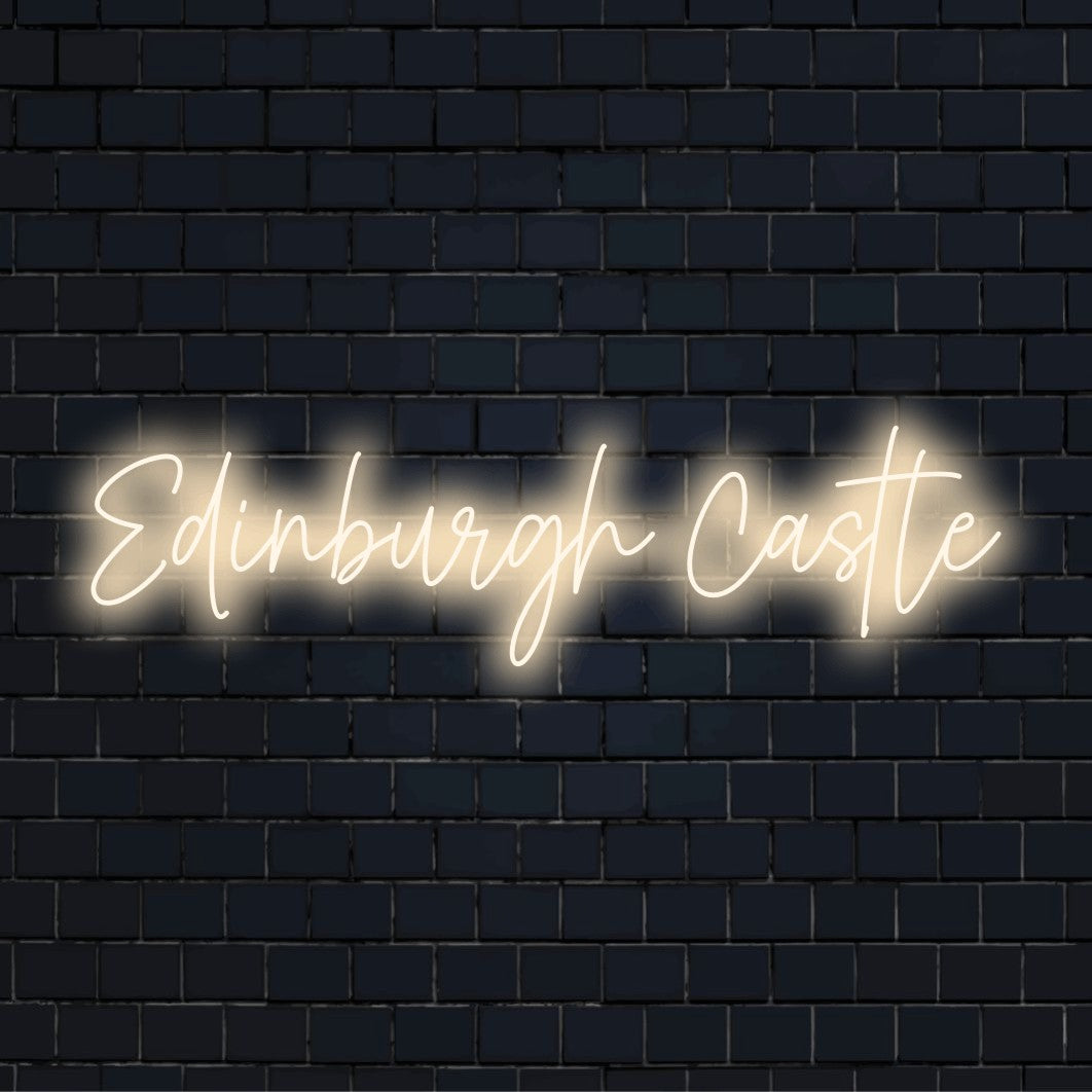 Edinburgh Castle Neon Sign, bright neon lettering against brick backdrop